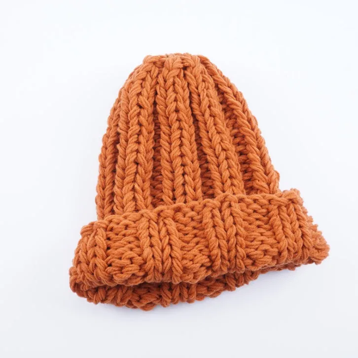 Europe and the United States new knit hat ladies autumn and winter fashion wild thick wool hat solid color simple earmuffs